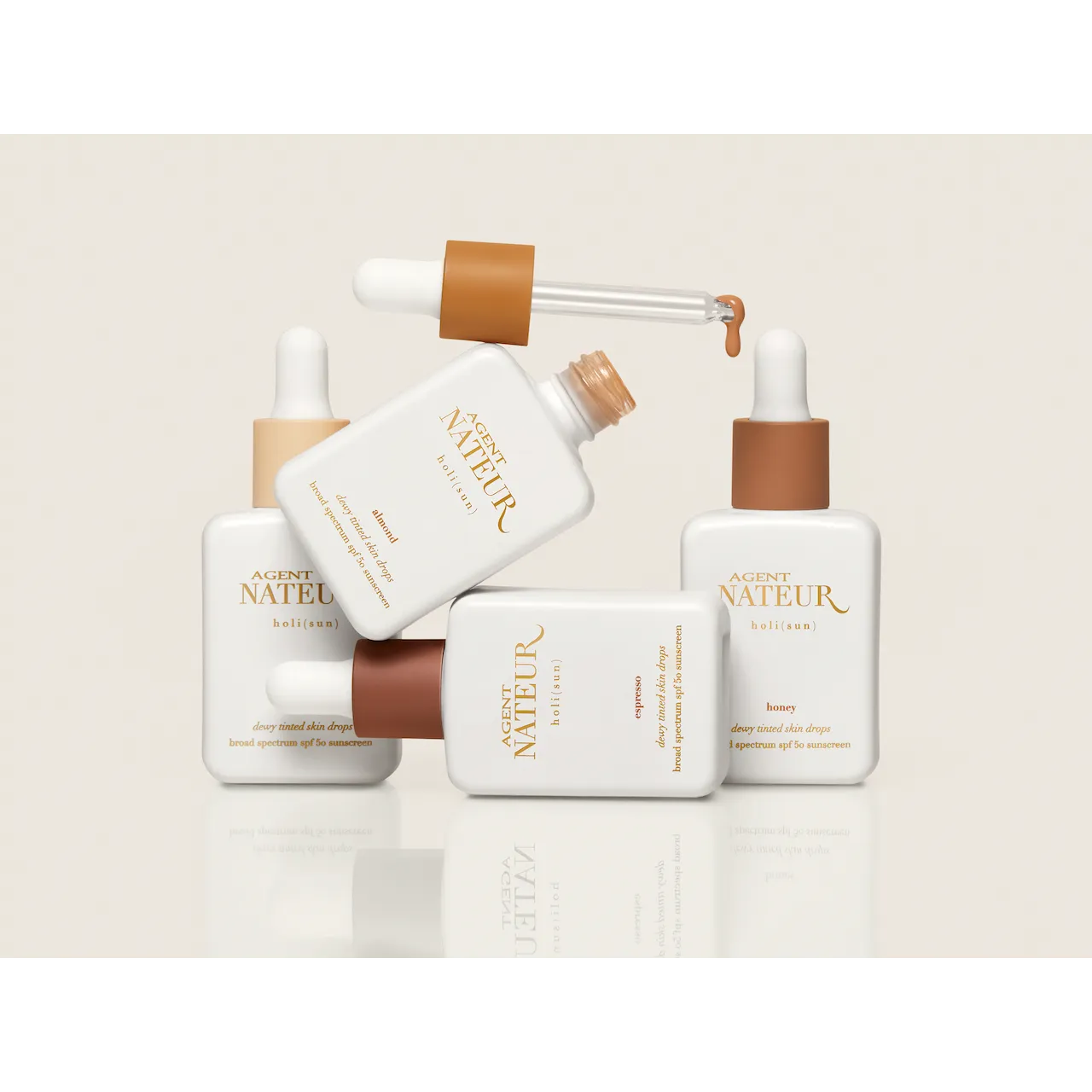 holi (sun) SPF 50 dewy tinted skin drops